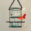 Blown glass - bottle in metal stand birdfeeder