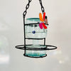 Blown glass - bottle in metal stand birdfeeder