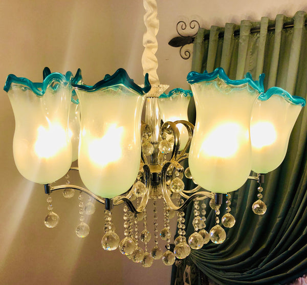 Chandelier modification - addition of 8 light cups w turquoise rim