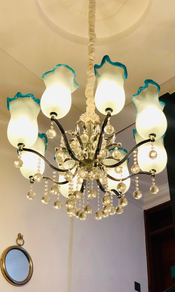 Chandelier modification - addition of 8 light cups w turquoise rim